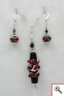 Pendant set black with red dots & swirls